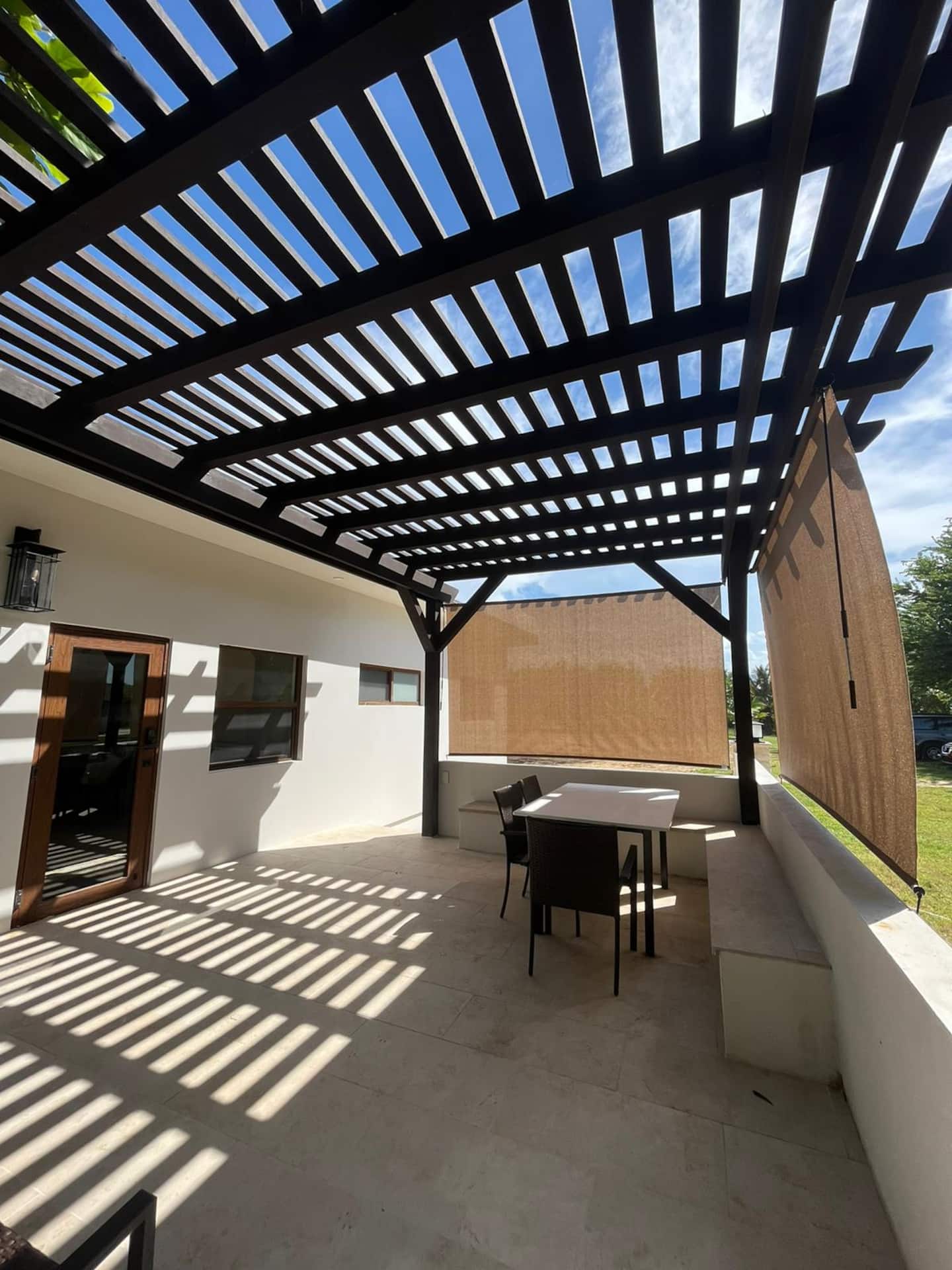 The covered ocean-view patio at Yogananda 2